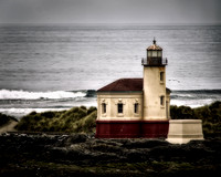 Dark Lighthouse Against a Sullen Sea